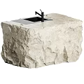 Natural Rough Stone Washbasin With Black Faucet And Organic Textured Surface