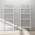 White Shelving Units Against Light Wall With Multiple Shelves On Wooden Floor With Light Shadow