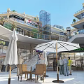 Vibrant Commercial Street With Outdoor Dining Area Umbrellas Seats Shops And Pedestrians