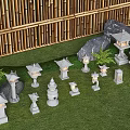 Various Stone Lanterns Arranged On Grass With Bamboo Fence And Rocks