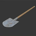 Rustic Shovel With Wooden Handle And Blue Blade Isolated On Dark Background