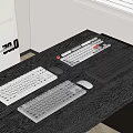 Various Colored Computer Keyboards And Mice On Desktop Office Table