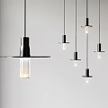Sleek Modern Black Metal Pendant Lights With Clear Glass Shades Hanging In Living Room