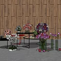 Colorful Flower Arrangements in Vases on Display Against Wooden Wall Background