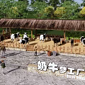 Scenic Rural Landscape Featuring Thatched Roof Shelter Cows Fence People and Green Trees