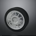 Car Wheel Rim And Tire Design With White Spokes And Black Rubber Tread