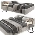 Modern Upholstered Double Bed With Layered Gray Beige Linens and Metal Frame Bedside Table
