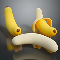 Fresh Yellow Bananas With Whole Peeled Fruit And Banana Peel On Shiny Surface