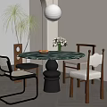 Round Marble Top Dining Table With Black Base Four Chairs Green Plants And Flower Arrangement