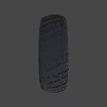 Off Road Vehicle Tire With Deep Tread Pattern And Silver Alloy Rim