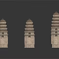 Three Ancient Stone Pagoda Models With Different Heights And Traditional Design