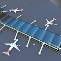Scenic Airport Landscape With Blue Roof Terminal Jet Bridges And Parked Airplanes