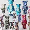 Colorful Bearbrick Sculptures With Various Patterns And Vibrant Designs Displayed