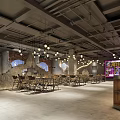 Industrial Style Hotpot Restaurant Interior With Pendant Lights Dining Tables And Brick Walls