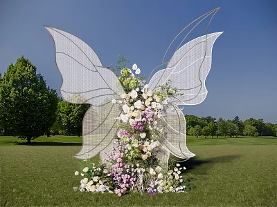 Outdoor Banquet Hall Decoration with Butterfly Shaped Design and Flower Arrangement on Green Lawn 3d model