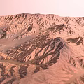 Arid Mountainous Terrain With Deep Valleys And Rugged Ridges Showcasing Dry Eroded Landform Features