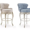 Light Gray And Blue Bar Stools With Carved Legs And Tufted Details