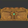 Golden Decorative Storage Box With Intricate Carved Patterns And Green Gemstone
