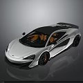 White McLaren Sports Car With Black Roof Orange Interior Black Wheels And Rear Spoiler
