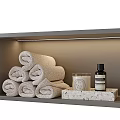 Stylish Bathroom Accessories With Rolled Towels Reed Diffusers Candles And Bottles On Shelf