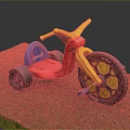 Kids Tricycle with Yellow Handlebars Red Body Blue Seat Black Wheels on Green Grass