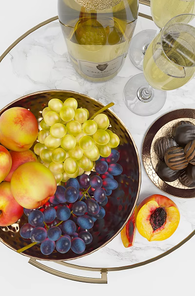 Fresh Peaches Green Purple Grapes Chocolates On Marble Table With Metal Bowl And Wine Glasses 3d model