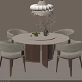 Modern Round Dining Table and Beige Upholstered Chairs Set With Walnut Legs and Decorative Vase