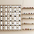Various Tea Sets with Teapots and Colorful Teacups on Wooden Multi Layer Display Racks