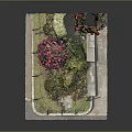 Small Garden Featuring Pink Flowers Red Blooms Green Plants Iron Decor And Stone Bench