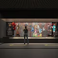 Person Viewing Various Traditional Costumes In Exhibition Display Cabinet Hall