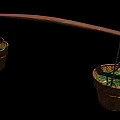 Traditional Wicker Baskets Hanging On Wooden Pole With Green Leaves For Daily Use