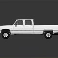 White Double Cab Pickup Truck With Cargo Bed And Front Grille Design