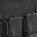 Bathroom Towel Rack With Wooden Base Black Metal Rods Hanging Gray Towels On Marble Wall