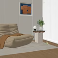 Beige Lazy Sofa With Brown Blanket Side Table Green Plant And Lamp On Light Carpet