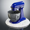 Blue Stand Mixer Kitchen Appliance With Stainless Steel Bowl On White Marble Countertop