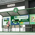 Starbucks Themed Green Bus Shelter with Advertisement Billboards and Woman Holding Bag