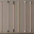 Different Designs Pendant Light Rods in Black White Wood Colors Arranged Neatly on Gray Background