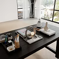 Modern Black Table with Magazines Lamp Pen Holder and Daily Items by Large Windows with Green Plants