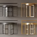 Stylish Gray And Gold Revolving Doors With Glass Panels And Metal Frames