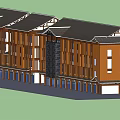 Traditional Style Commercial Complex With Brown Facade And Retail Storefronts