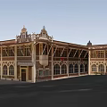 Traditional Architecture With Red Tiled Roof Arched Windows Stone Facade And Decorative Spires