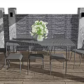 Modern Metal Table And Chairs Set With Flower Vase Striped Stools And Potted Plants