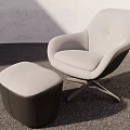 Modern Gray Upholstered Armchair and Ottoman Set with Curved Design and Metal Base