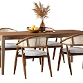 Wooden Dining Table Set With Four Rattan Backrest Chairs Gray Cushions And Fruit Basket