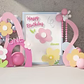 First Birthday Party Decorations With Pink Flowers Balloons And Happy Sign