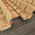 Neatly Arranged Beige Public Chairs With Wooden Armrests And Small Tables On Striped Carpet