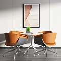 Modern Interior Space With Round White Table And Orange Chairs Metal Legs Wall Art And Potted Plant