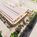 Aerial View Of Large Commercial Building With Parking Lot Vehicles And Surrounding Trees
