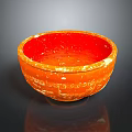 Artistic Orange Carved Bowl Sculpture With Textured Surface On Gray Background