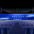 Spacious Conference Venue With Arranged Seats Stage Lights And Large Screen